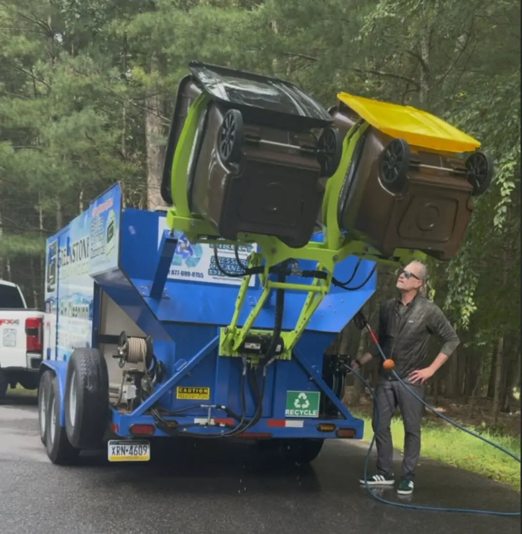 Nelson operating Greenstone Cleaning Co.'s purpose-built bin cleaning equipment