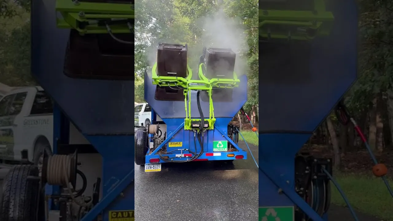 Nelson demonstrating Greenstone's professional trash bin cleaning process